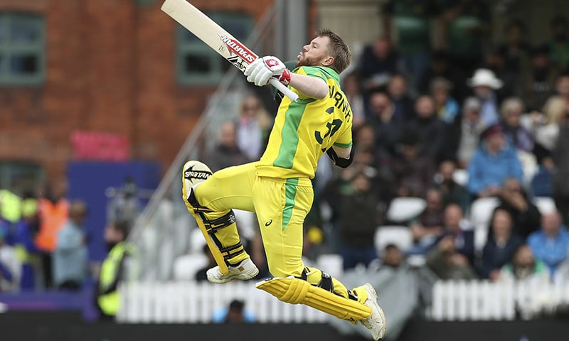 Australia's David Warner celebrates his century during the World Cup match against Pakistan. ─ AP