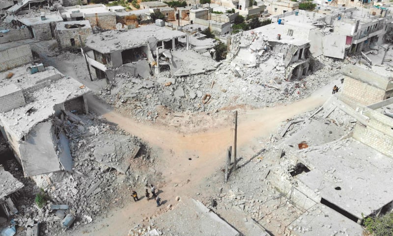 Damaged and destroyed buildings in Ihsim, a town in Syria’s Idlib region.—AFP