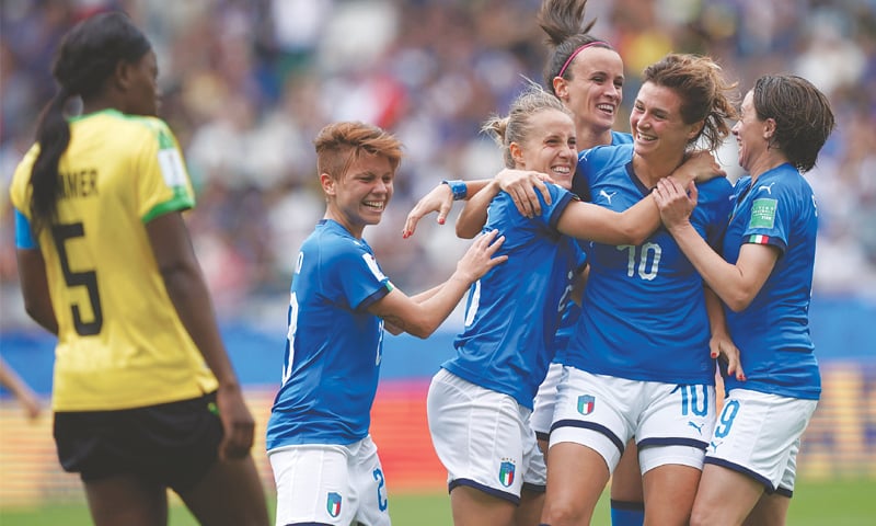 REIMS: Italy&rsquo;s forward Cristiana Girelli (second R) celebrates with team-mates after scoring during the Women&rsquo;s World Cup Group &lsquo;C&rsquo; match against Jamaica at the Auguste-Delaune Stadium.&mdash;AFP