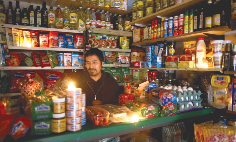 Buenos Aires: A vendor waits for customers during a national blackout on Sunday. — Reuters