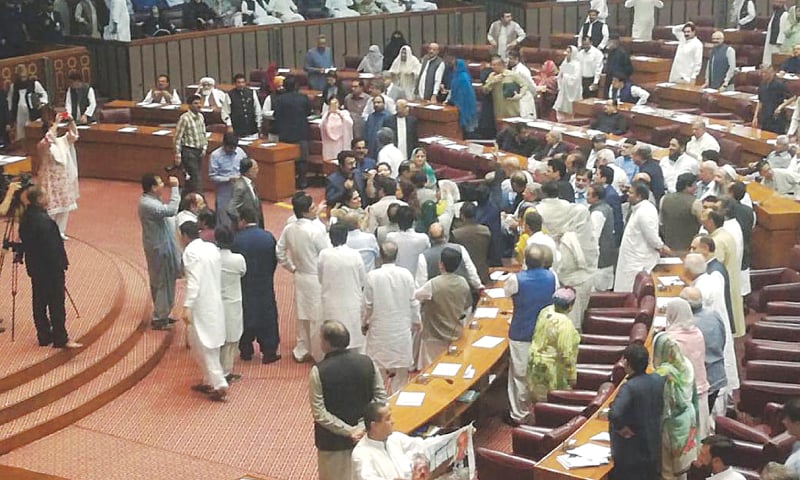 ISLAMABAD: Ruling PTI lawmakers protesting during Leader of the Opposition in the National Assembly Shahbaz Sharif’s speech in the lower house of parliament on Monday. — INP