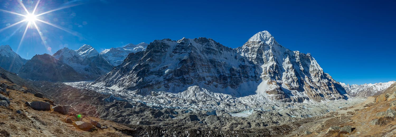 Kangchenjunga Massif and Kangchenjunga Glacier light up after sunrise.