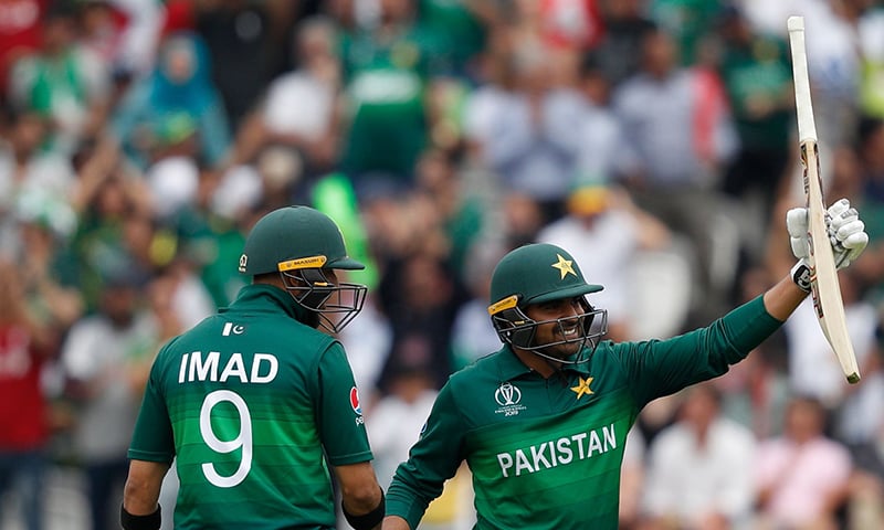 Haris Sohail (R) celebrates with Imad Wasim after scoring a half-century during the 2019 Cricket World Cup group stage match between Pakistan and South Africa at Lord's. ─ AFP