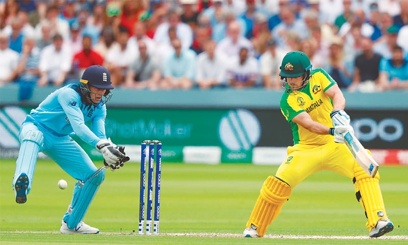 LONDON: Australian captain Aaron Finch cuts past England wicket-keeper Jos Buttler during their match at Lord’s on Tuesday.—AFP