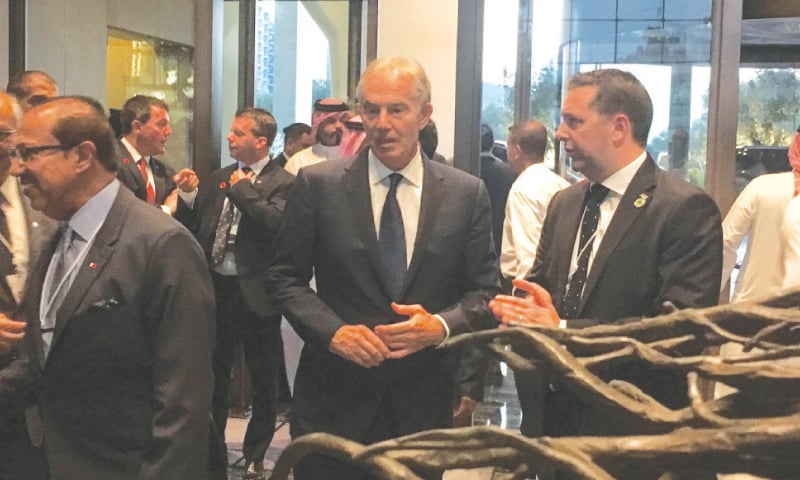 Manama: Former British prime minister Tony Blair (centre) arrives in the Bahraini capital to attend the conference.—AFP