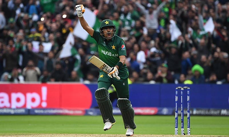 Pakistan's Babar Azam celebrates after scoring a century. — AFP