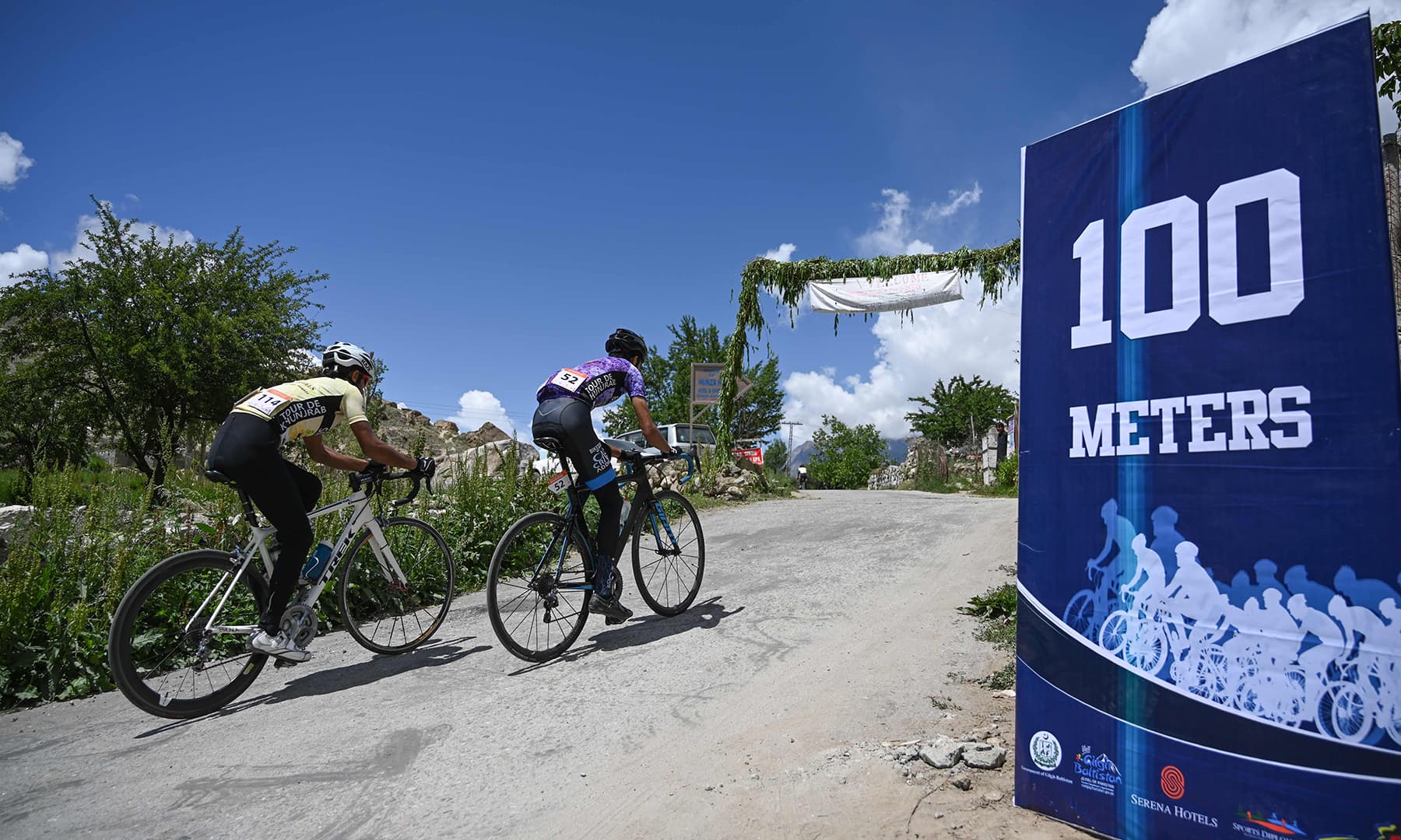 Pakistani cyclist takes part in Tour de Khunjrab cycling race in Duikar Altit, Hunza on June 28. — AFP