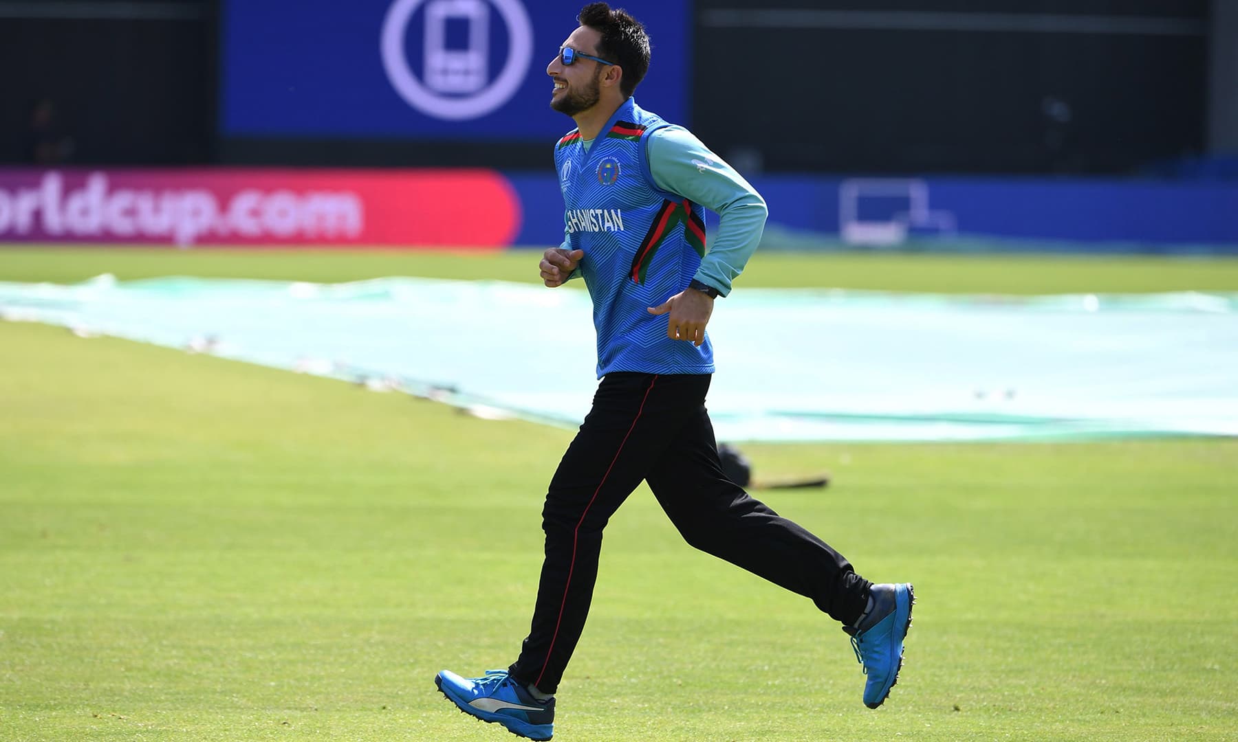 Afghanistan's Rahmat Shah pictured jogging during training at Headingly. —AFP