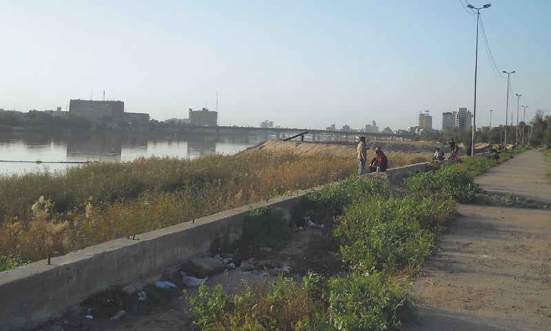 A bridge on the River Tigris, downtown Baghdad in the background