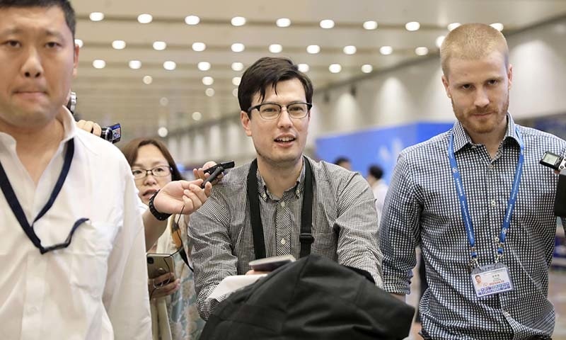 An Australian student Alek Sigley, 29,  who was detained in North Korea, arrives at Beijing international airport in Beijing, China on July 4. — Kyodo via Reuters