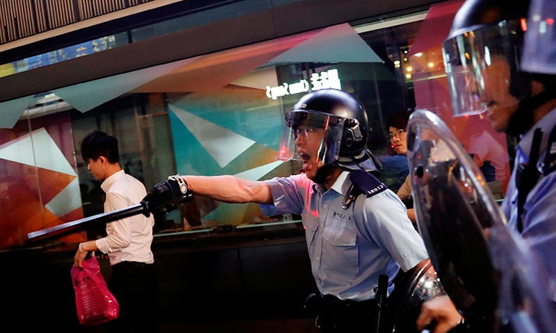 Riot police try to disperse anti-extradition bill protesters after a march at Hong Kong's tourism district Nathan Road near Mongkok, China July 7. — Reuters Riot police try to disperse anti-extradition bill protesters after a march at Hong Kong's tourism district Nathan Road near Mongkok, China July 7. — Reuters