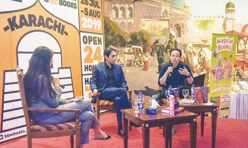 ANDREW Yap speaks at the event on Wednesday while (right) a pop-up book on display features Deep Space Nine, the iconic Star Trek space station.
—Fahim Siddiqi / White Star