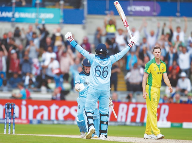 England’s Eoin Morgan and Joe Root celebrate after their victory in the semi-final.—Reuters