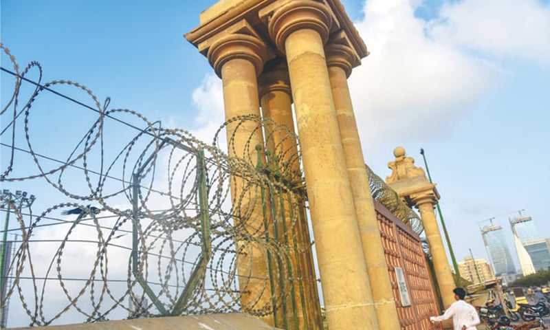 Tall gates, walls and barbed wire. — Photos by Fahim Siddiqi / White Star