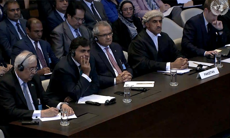 (L-R) Attorney General Anwar Mansoor, diplomat Mohammad Faisal, Ambassador of Pakistan in the Netherlands, Shujjat Ali Rathore, and Barrister Khawar Qureshi listen to the judgment.