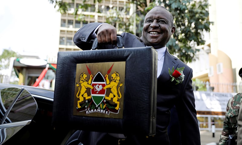 This file photo shows Kenya's Cabinet Secretary for National Treasury (Finance Minister) Henry Rotich holding up a briefcase containing the Government Budget for the 2019/20 fiscal year in Nairobi, Kenya on June 13, 2019. — Reuters