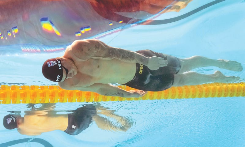 GWANGJU: Britain’s Adam Peaty competes in the men’s 100m breaststroke final during the World Swimming Championships at the Nambu University Municipal Aquatics Center on Monday.—AFP GWANGJU: Britain’s Adam Peaty competes in the men’s 100m breaststroke final during the World Swimming Championships at the Nambu University Municipal Aquatics Center on Monday.—AFP
