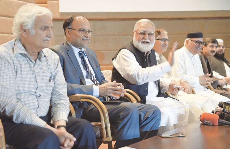 Opposition leaders Akram Durrani, Ahsan Iqbal, Farhatullah Babar, Nayyer Bokhari, Mian Iftikhar and Owais Noorani at a press conference on Monday. —Tanveer Shahzad / White Star