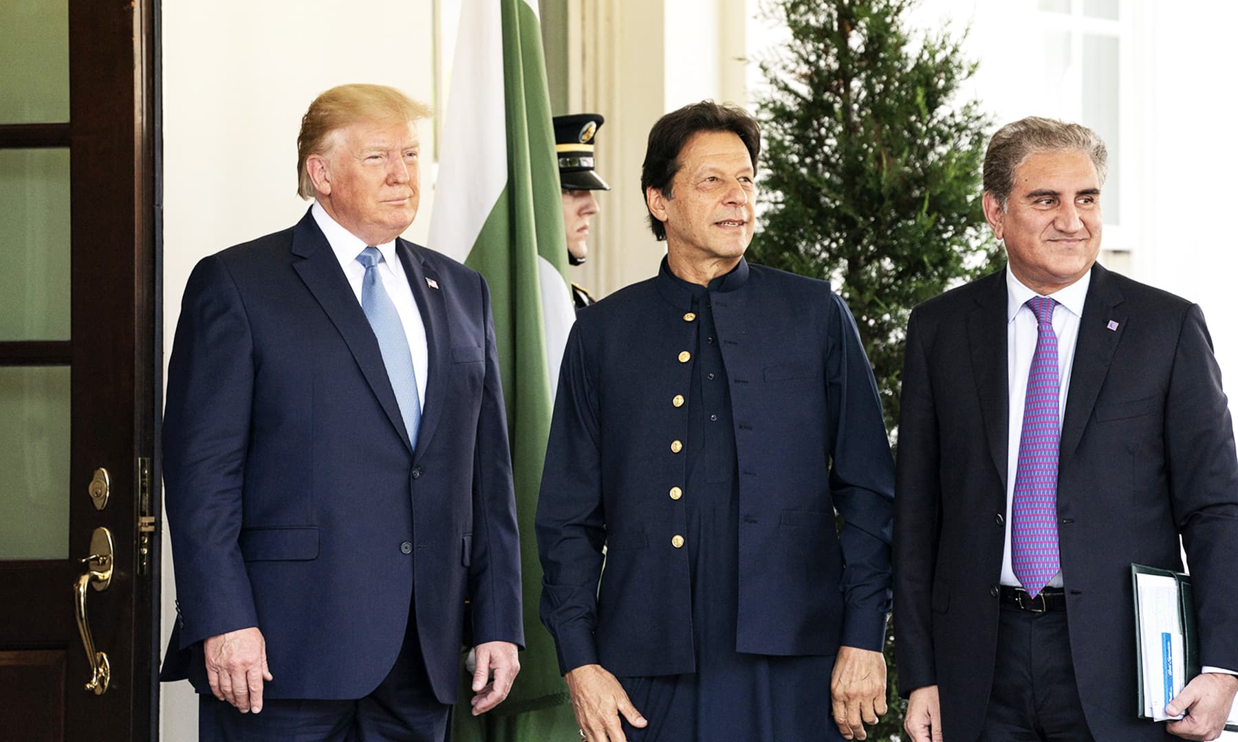 Foreign Minister Shah Mahmood Qureshi pictured with PM Imran and President Trump.  — Photo courtesy White House Flickr