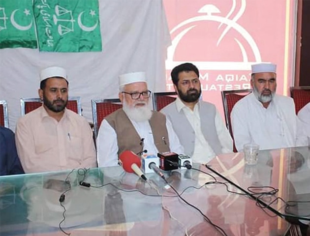 Jamaat-i-Islami leader Liaquat Baloch addresses a presser in Timergara on Sunday. &mdash;Dawn