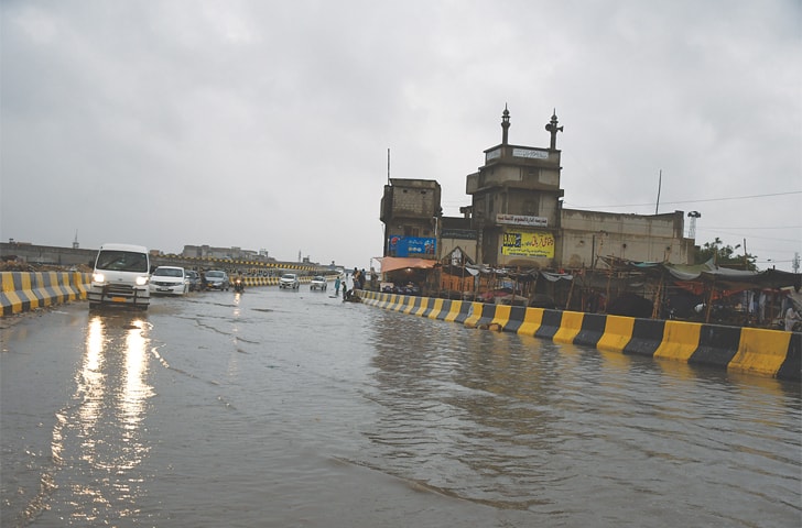 Standing water can be seen on the Lyari Expressway.—Faisal Mujeeb / White Star