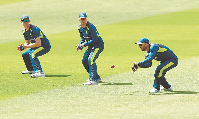 BIRMINGHAM: (L to R) Australia’s Cameron Bancroft, Steve Smith and David Warner attend a fielding practice session at Edgbaston on Monday.—Reuters