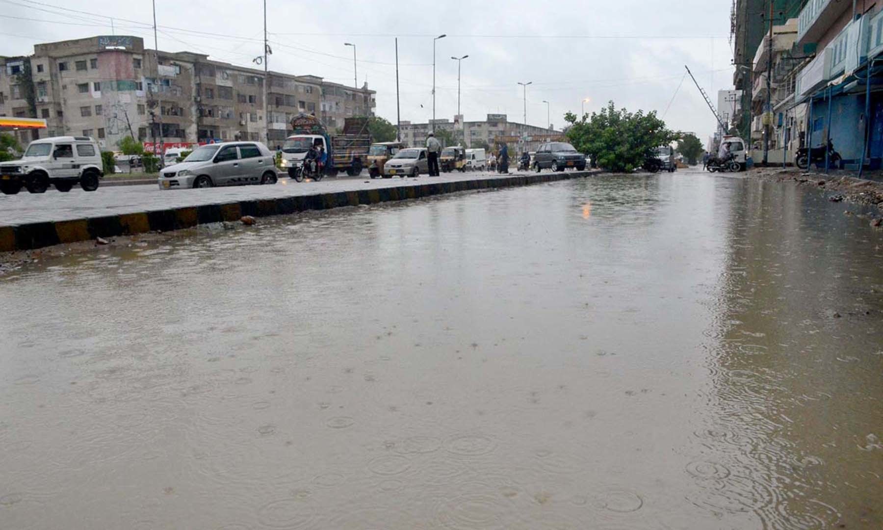 A view of stagnant water during heavy rain in Karachi on Monday. — APP