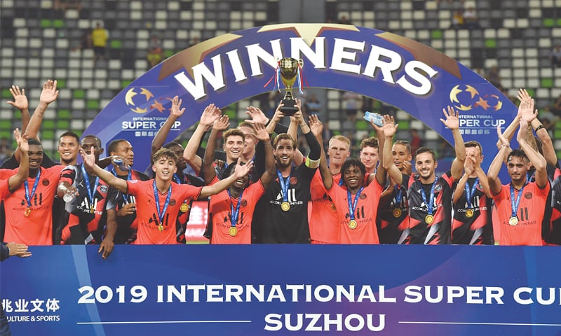 SUZHOU: PSG players celebrate after winning the International Super Cup at the Suzhou Olympic Sports Center Stadium on Tuesday.&mdash;AFP