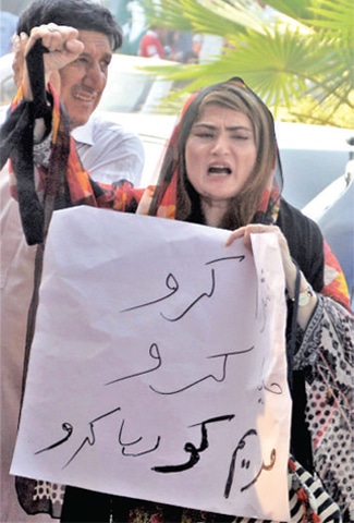 A PML-N activist shouts slogans during a protest in Peshawar on Thursday against the arrest of party leader Maryam Nawaz. &mdash; White Star