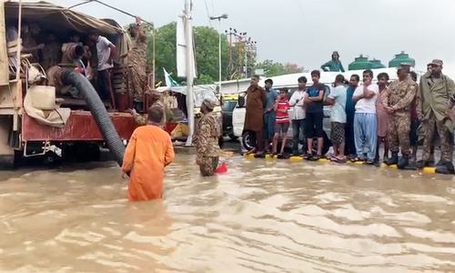 A rescue operation by Rangers is underway in Karachi. — Photo by Imtiaz Ali