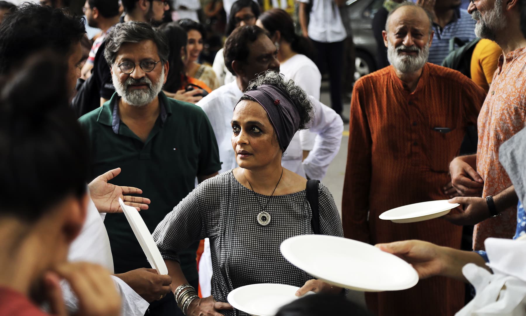 Award winner author Arundhati Roy, center, participates in a gathering of Kashmiri people residing in India.&mdash; AP
