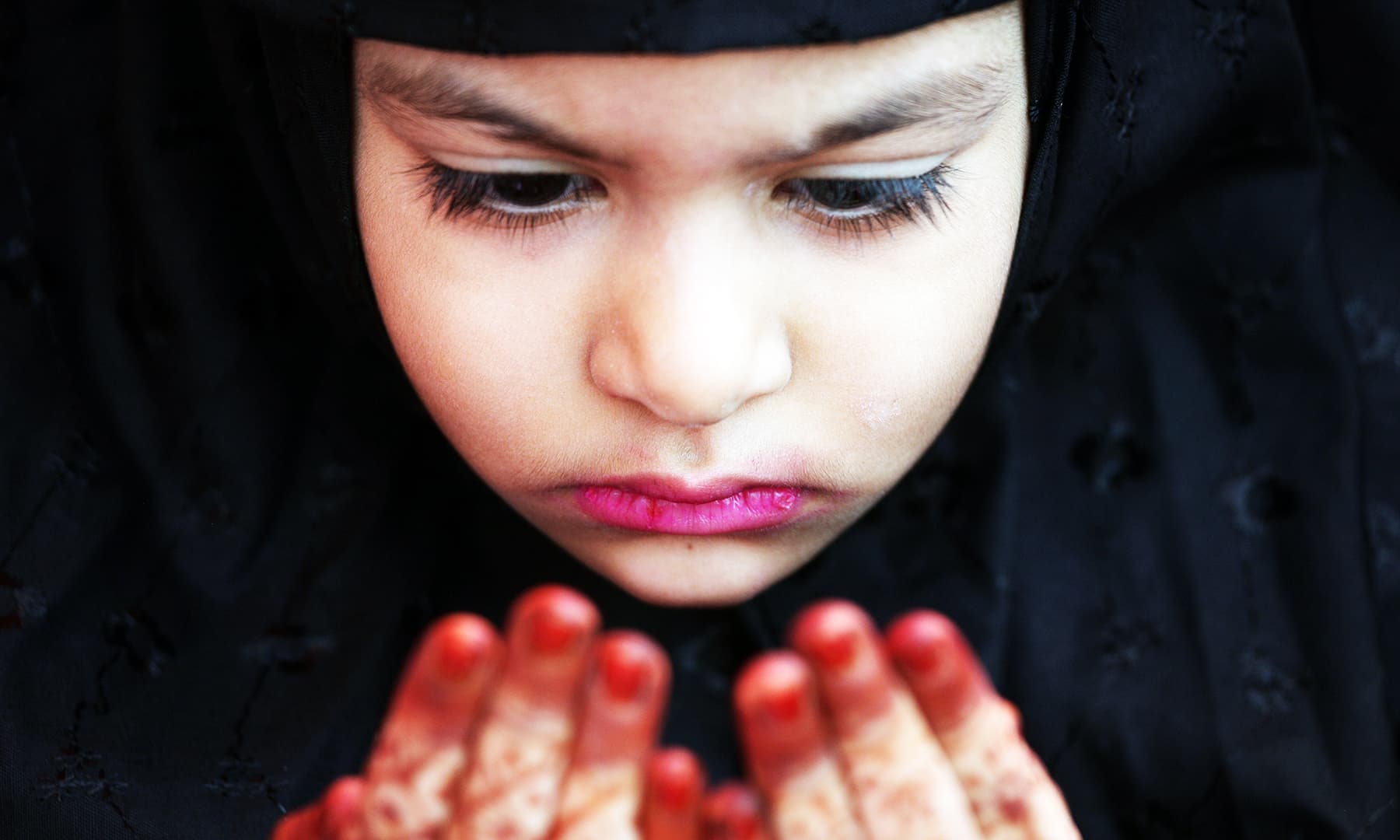 A Muslim girl offers an Eidul Azha prayer at a mosque in Chennai, India on Monday. &mdash; Reuters