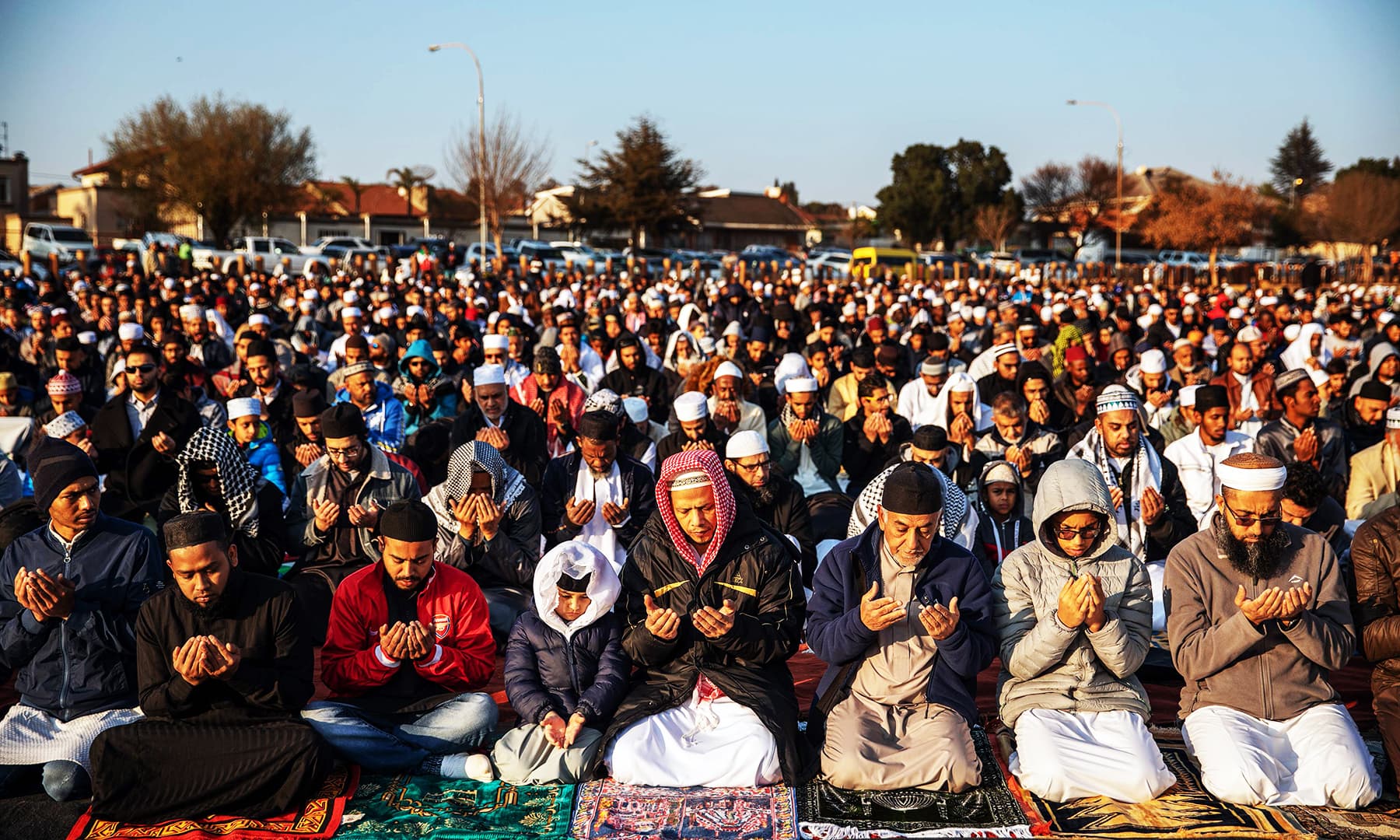 South African Muslims gather to offer Eidul Azha prayers in an open field in Lenasia, 30km south of Johannesburg, on Monday. &mdash; AFP