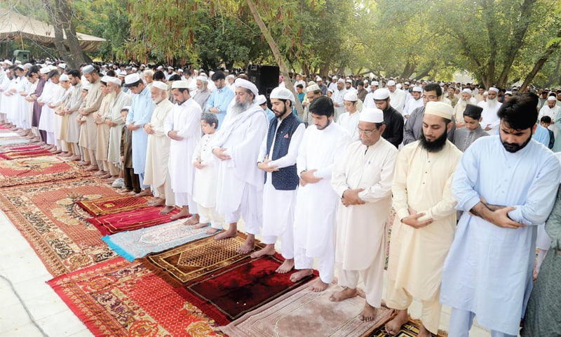 People offer Eidul Azha prayers at the Eidgah on Charsadda Road, Peshawar, on Monday. — White Star