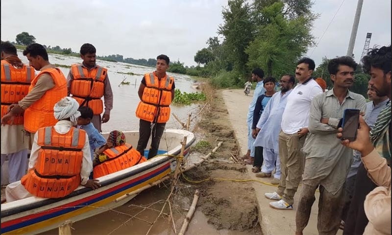 Flood evacuation and sensitisation efforts underway by the Kasur district administration. — Photo by Muhammad Taimoor