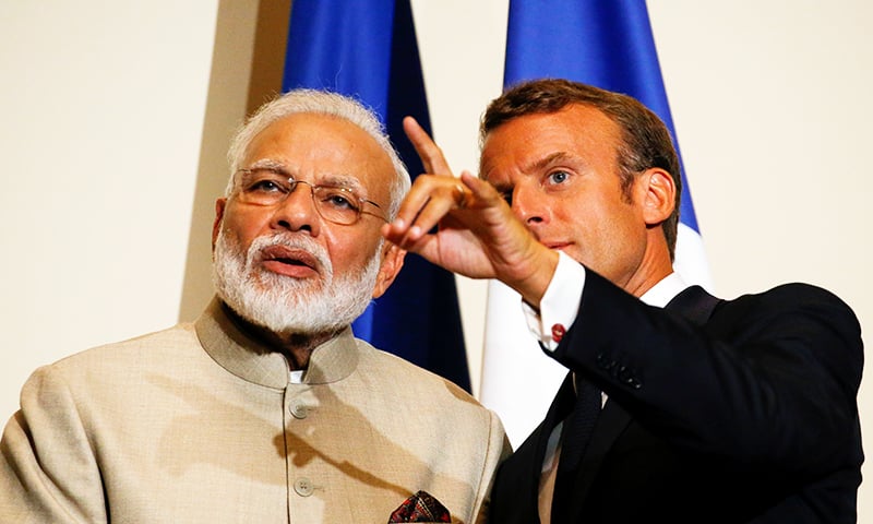 French President Emmanuel Macron gestures next to Indian Prime Minister Narendra Modi after a joint statement at the Chateau of Chantilly, near Paris, France on August 22. — REUTERS