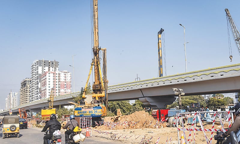 Public projects such as this flyover in Karachi have been badly hit by budget cuts, thereby depressing demand for cement.