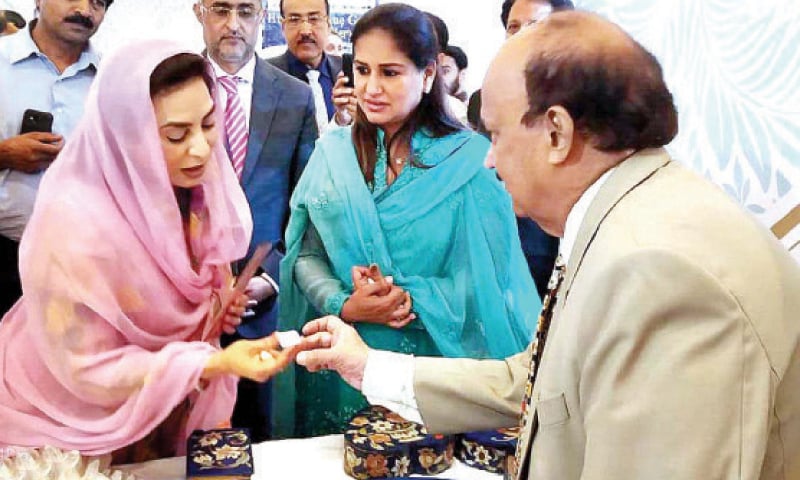 Minister for Inter-Provincial Coordination Dr Fehmida Mirza visits a stall at an exhibition organised by RCCI on Saturday. — APP Minister for Inter-Provincial Coordination Dr Fehmida Mirza visits a stall at an exhibition organised by RCCI on Saturday. — APP