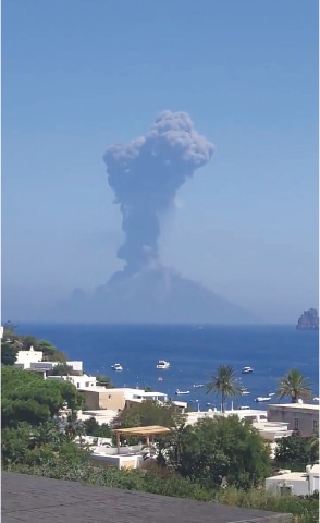 PANAREA (Italy): Smoke rises from Stromboli volcano on Wednesday in this still image obtained from social media video.—Reuters