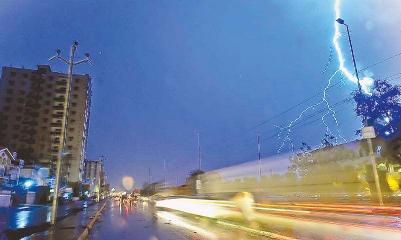 K-Electric blames urban flooding due to rain and encroachment around power installations. — Dawn/File