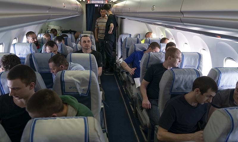 Prisoners aboard a plane on the way to Ukraine travelling to Boryspil airport, outside Kyiv, Ukraine, on September 7. — Ukrainian Presidential Press Office via AP Prisoners aboard a plane on the way to Ukraine travelling to Boryspil airport, outside Kyiv, Ukraine, on September 7. — Ukrainian Presidential Press Office via AP