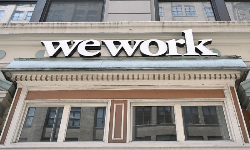 A WeWork office is seen in New York City on July 19, 2019. WeWork has slashed by more than half its valuation target after setting an ambitious goal for the fast-growing office-sharing startup, sources familiar with the company said last week. WeWork parent We company is eyeing a target market value of around $20 billion after hearing doubts about its prospects from potential investors over a $47 billion valuation, the sources said. The startup launched in 2010 touts itself as revolutionising commercial real estate by offering shared, flexible work space arrangements, and has operations in 111