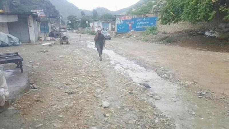 The Nawagai Bazaar road, Bajaur, after being hit by flash flood. &mdash;Dawn