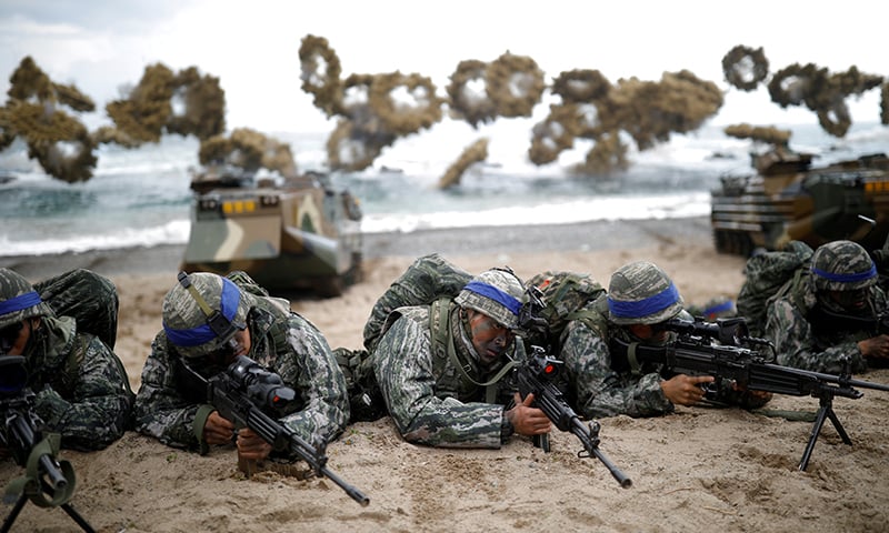 South Korean marines take part in a US-South Korea joint landing operation drill as part of the two countries' annual military training called Foal Eagle in Pohang South Korea