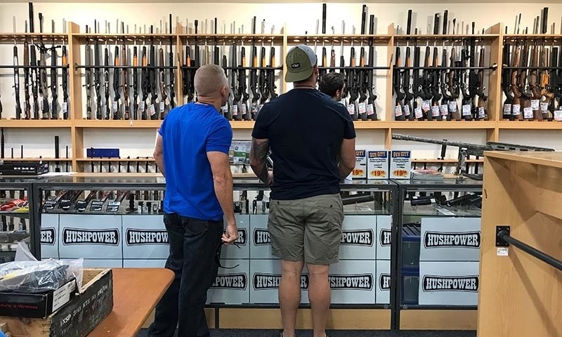 People look at firearms and accessories on display at Gun City gunshop in Christchurch, New Zealand, March 19, 2019. — Reuters/File People look at firearms and accessories on display at Gun City gunshop in Christchurch, New Zealand, March 19, 2019. — Reuters/File