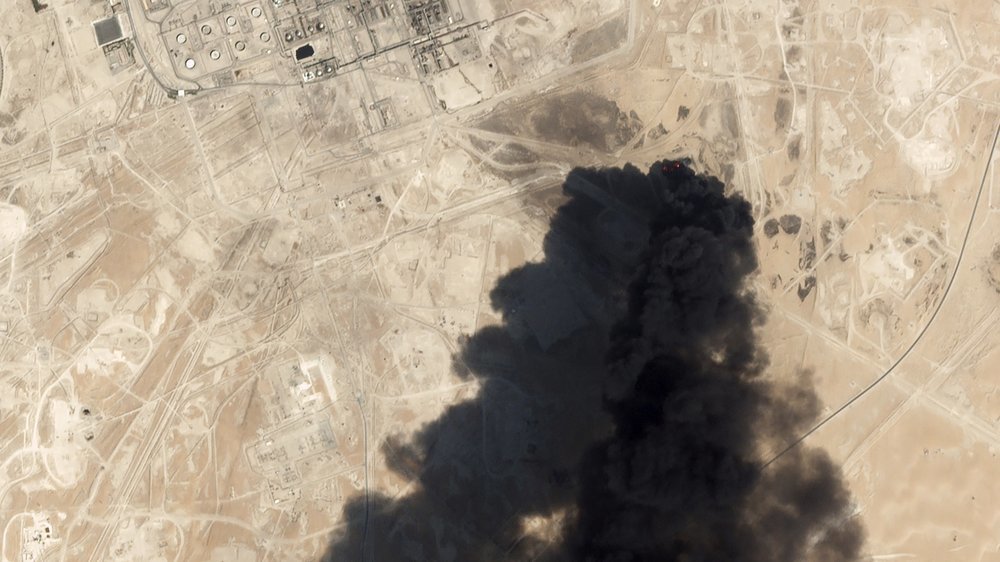 This Sept 14 satellite image from Planet Labs Inc. shows thick black smoke rising from Saudi Aramco's Abqaiq oil processing facility in Buqyaq, Saudi Arabia. — AP