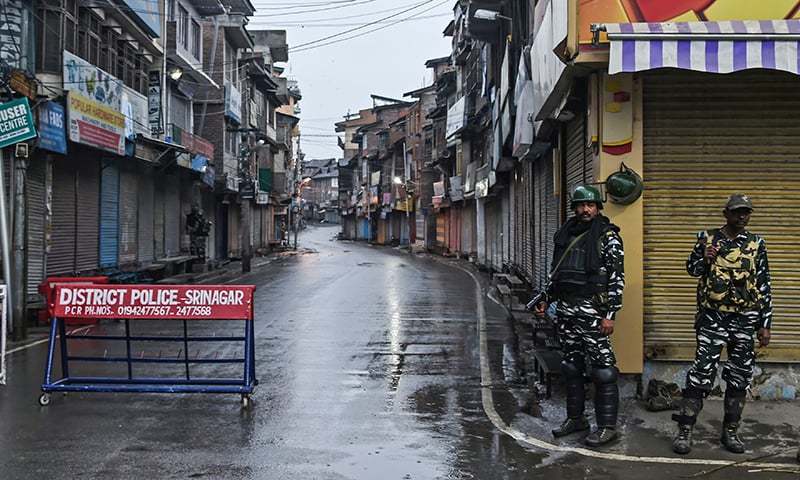 Security personnel stand guard during a lockdown in Srinagar on August 14, 2019, after the Indian government stripped occupied Jammu and Kashmir of its autonomy. — AFP