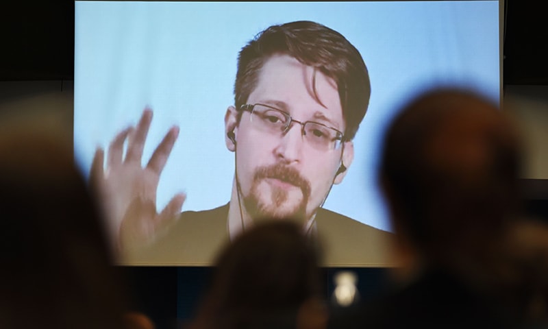 In this file photo taken on March 15, 2019 former US NSA contractor and whistle blower Edward Snowden speaks via video link from Russia as he takes part in a round table meeting on the subject of "Improving the protection of whistleblowers", at the Council of Europe in Strasbourg, eastern France. &mdash; AFP