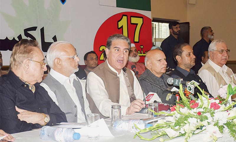 LAHORE: Foreign Minister Shah Mehmood Qureshi speaking at a multiparty Kashmir conference on Tuesday. — White Star