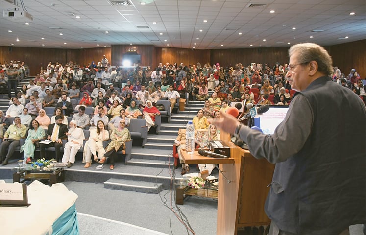 Federal Education Minister Shafqat Mahmood speaks at the KU programme on Wednesday.—Faysal Mujeeb/White Star